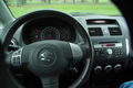 Suzuki SX4 - 1.9 D Exclusive Gratis onderhoudsbeurt en tenaamstelling - 1 - Thumbnail