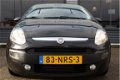 Fiat Punto Evo - 1.3 CLIMA CRUISE TREKHAAK DONKER GLAS 15''LM-VELGEN - 1 - Thumbnail