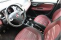 Fiat Punto Evo - 1.3 CLIMA CRUISE TREKHAAK DONKER GLAS 15''LM-VELGEN - 1 - Thumbnail