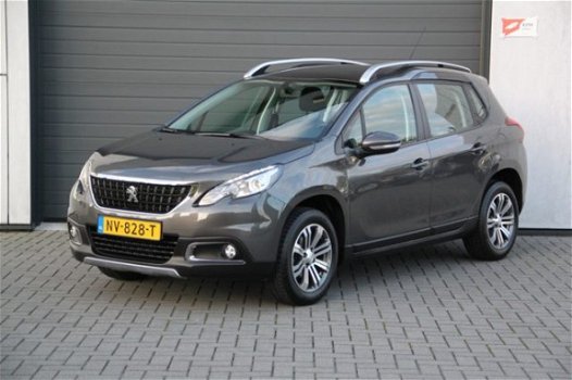 Peugeot 2008 - STYLE 1.2 PURETECH - Airco - Navi - Cruise - PDC - Panorama dak - 1