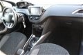 Peugeot 2008 - STYLE 1.2 PURETECH - Airco - Navi - Cruise - PDC - Panorama dak - 1 - Thumbnail