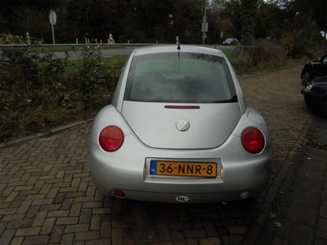 Volkswagen New Beetle - 1.6 Highline - 1