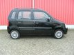 Suzuki Wagon R+ - 1.0 Comfort - 1 - Thumbnail