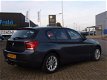 BMW 1-serie - 2.0D Exclusive Line Aut8 Navi Velgen Stoelverwarm Trekhaak - 1 - Thumbnail