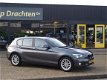 BMW 1-serie - 2.0D Exclusive Line Aut8 Navi Velgen Stoelverwarm Trekhaak - 1 - Thumbnail