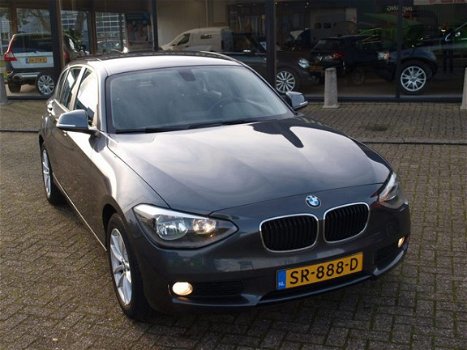 BMW 1-serie - 2.0D Exclusive Line Aut8 Navi Velgen Stoelverwarm Trekhaak - 1