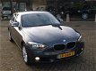 BMW 1-serie - 2.0D Exclusive Line Aut8 Navi Velgen Stoelverwarm Trekhaak - 1 - Thumbnail