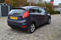 Ford Fiesta - 1.25 Titanium 5.Drs 1e eigenaar model 2012 91.000 km airco stoelverw. parkeersensoren - 1 - Thumbnail