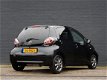 Toyota Aygo - 1.0-12V Dynamic Navigator AUTOMAAT NAVI LM VELGEN - 1 - Thumbnail