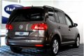 Volkswagen Touran - 1.2 TSI Highline BlueMotion NAVI CRUISE PDC STOELVERW. '12 - 1 - Thumbnail