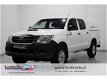 Toyota HiLux - 2.5 DI 145 pk 4WD Grijs Kenteken met 2 Zitplaatsen Airco, Radio/CD, Laadbak over Laad - 1 - Thumbnail