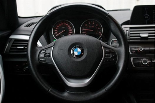 BMW 1-serie - 116i EDE Business Sport | Xenon | Navi | 17inch | Rijklaar - 1