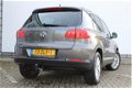 Volkswagen Tiguan - 1.4 TSI 160pk Sport&Style | Navigatie | Park assist + Parkeersensoren | Trekhaak - 1 - Thumbnail