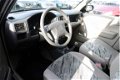 Mazda Demio - 1.3 GLX STUURBEKR/ELEKRAM/APK 06-2020 - 1 - Thumbnail