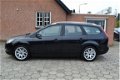 Ford Focus Wagon - 1.6 Titanium Sport 1e eigenaar model 2010 airco half-leer 17''velgen radio/cd+stu - 1 - Thumbnail