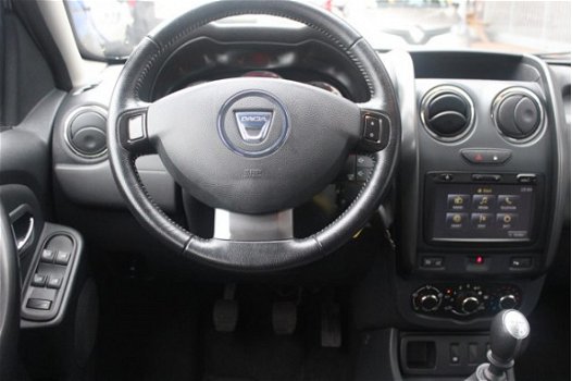 Dacia Duster - TCe 125pk 4x2 Prestige | Navi | Airco | Cruise | Leder | Trekhaak | Slechts 47.000km - 1