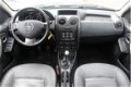 Dacia Duster - TCe 125pk 4x2 Prestige | Navi | Airco | Cruise | Leder | Trekhaak | Slechts 47.000km - 1 - Thumbnail