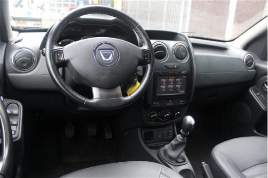Dacia Duster - TCe 125pk 4x2 Prestige | Navi | Airco | Cruise | Leder | Trekhaak | Slechts 47.000km - 1