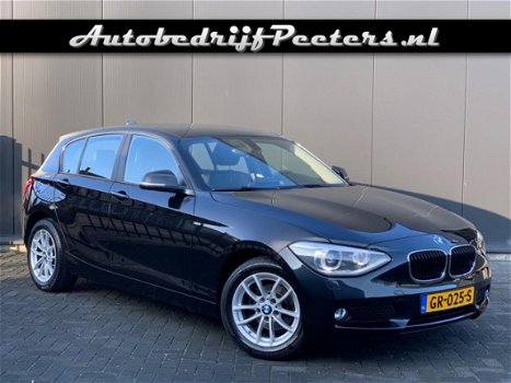 BMW 1-serie - 114i High Exe Xenon Leder Navigatie PDC - 1