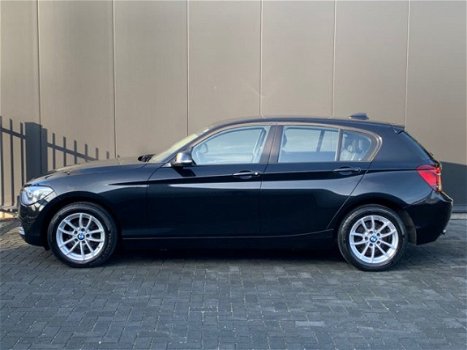 BMW 1-serie - 114i High Exe Xenon Leder Navigatie PDC - 1