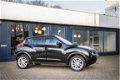 Nissan Juke - 1.6 Automaat 101.660km navi, camera en dealer onderhouden - 1 - Thumbnail