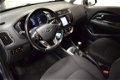 Kia Rio - 1.2 CVVT ComfortPlus | Navigatie | Camera | Cruise Control - 1 - Thumbnail