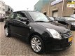 Suzuki Swift - 1.3 Comfort zeer nette auto. muziekinstallatie - 1 - Thumbnail