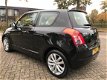 Suzuki Swift - 1.3 Comfort zeer nette auto. muziekinstallatie - 1 - Thumbnail