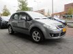 Suzuki SX4 - 1.9 D Exclusive 5 Deurs Clima - 1 - Thumbnail