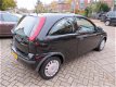 Opel Corsa - 1.2-16V Rhythm AUTOMAAT - 1 - Thumbnail