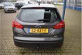 Ford Focus Wagon - 1.0 TITANIUM 125 PK NAVI DRIVER PACK TREKHAAK - 1 - Thumbnail