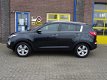 Kia Sportage - 2.0 X-ecutive Plus Pack met navigatie, trekhaak - 1 - Thumbnail