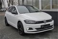 Volkswagen Polo - 1.0 TSI Sport Navi|APPConnect|Cruis|PDC|LED Wit - 1 - Thumbnail