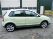 Volkswagen Polo - 1.4-16V FUN Airco, Cruise control, Elektrisch schuif/kanteldak, Cross-fun - 1 - Thumbnail