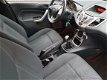 Ford Fiesta - 1.25 Titanium BJ.2011 / Airco / Lichtmetalen velgen / 5drs - 1 - Thumbnail