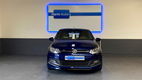 Volkswagen Polo - 1.4-16V R-Line 5-deurs climate control navi pdc - 1 - Thumbnail