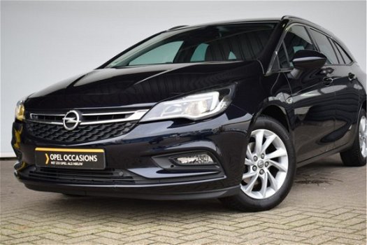 Opel Astra - Business Executive ST | Leder | Navigatie | Camera | Dode hoek sensoren | - 1