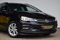 Opel Astra - Business Executive ST | Leder | Navigatie | Camera | Dode hoek sensoren | - 1 - Thumbnail