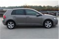 Volkswagen Golf - 1.2 TSI Highline 110PK | Adapt CC | Xenon | Navi | PDC | Garantie - 1 - Thumbnail