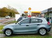 BMW 1-serie - 118i Aut/Airco/El.ramen/Dak/LMV/NAP/APK - 1 - Thumbnail