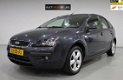 Ford Focus - 1.8-16V Ambiente Flexifuel Eerste Eigenaar, Airco, Cr Controle, NAP - 1 - Thumbnail