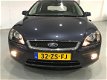 Ford Focus - 1.8-16V Ambiente Flexifuel Eerste Eigenaar, Airco, Cr Controle, NAP - 1 - Thumbnail