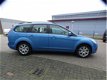 Ford Focus Wagon - 1.6 Trend / airco / cruise control / trekhaak / parrot - 1 - Thumbnail