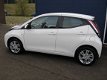 Toyota Aygo - 1.0 VVT-i X-pure Navigatie Cruise LM velgen NL - 1 - Thumbnail