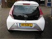 Toyota Aygo - 1.0 VVT-i X-pure Navigatie Cruise LM velgen NL - 1 - Thumbnail