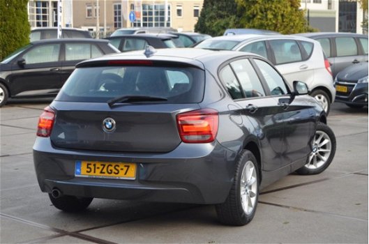 BMW 1-serie - 116i Upgrade Edition LEER | SPORTSTOELEN | NAVI | XENON | NAP - 1