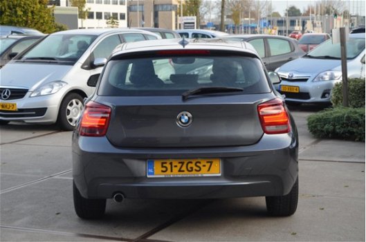 BMW 1-serie - 116i Upgrade Edition LEER | SPORTSTOELEN | NAVI | XENON | NAP - 1