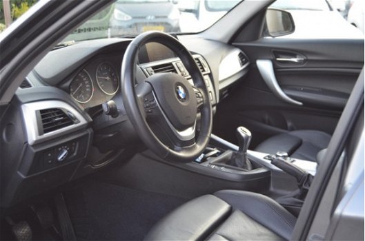 BMW 1-serie - 116i Upgrade Edition LEER | SPORTSTOELEN | NAVI | XENON | NAP - 1