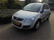 Suzuki SX4 - 1.6 VVT 120pk 2WD Aut. Exclusive bij Vakgarage® - 1 - Thumbnail