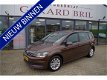 Volkswagen Touran - 1.2 TSI Comf. 7p NAVI/PDC/TREKHAAK/STANDKACHEL - 1 - Thumbnail